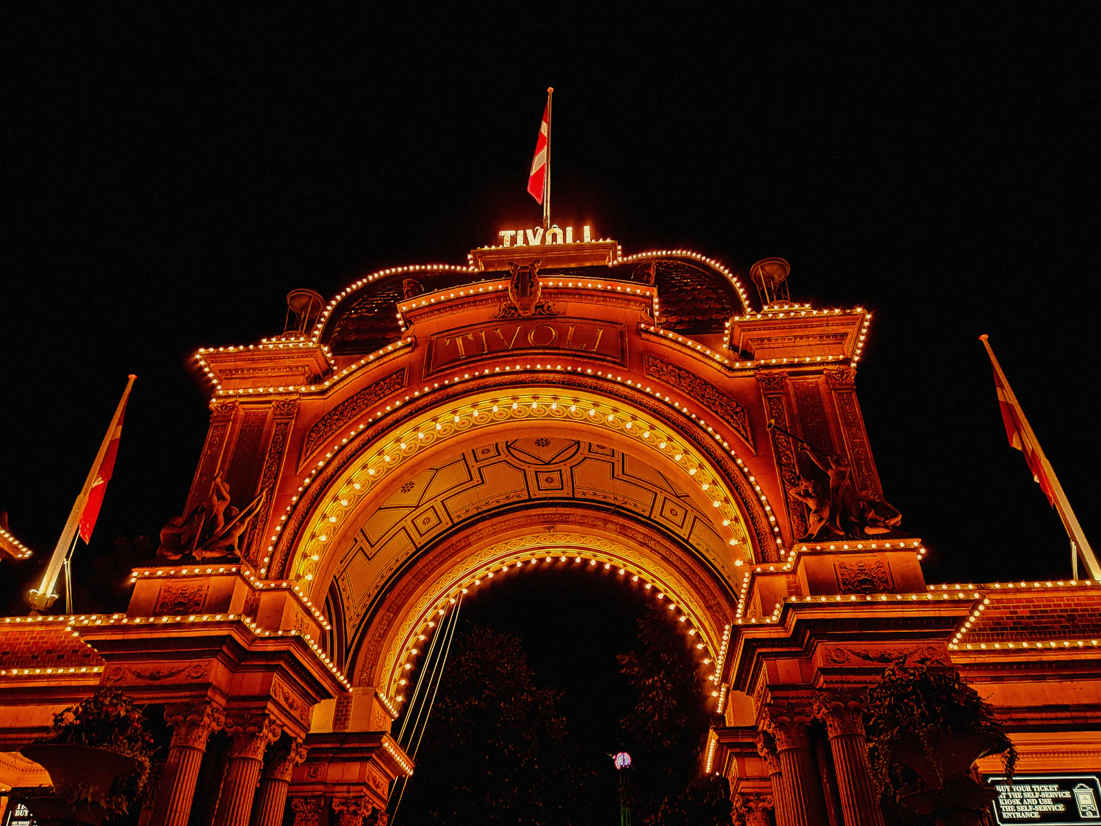 Tivoli Gardens illuminated at night in Copenhagen