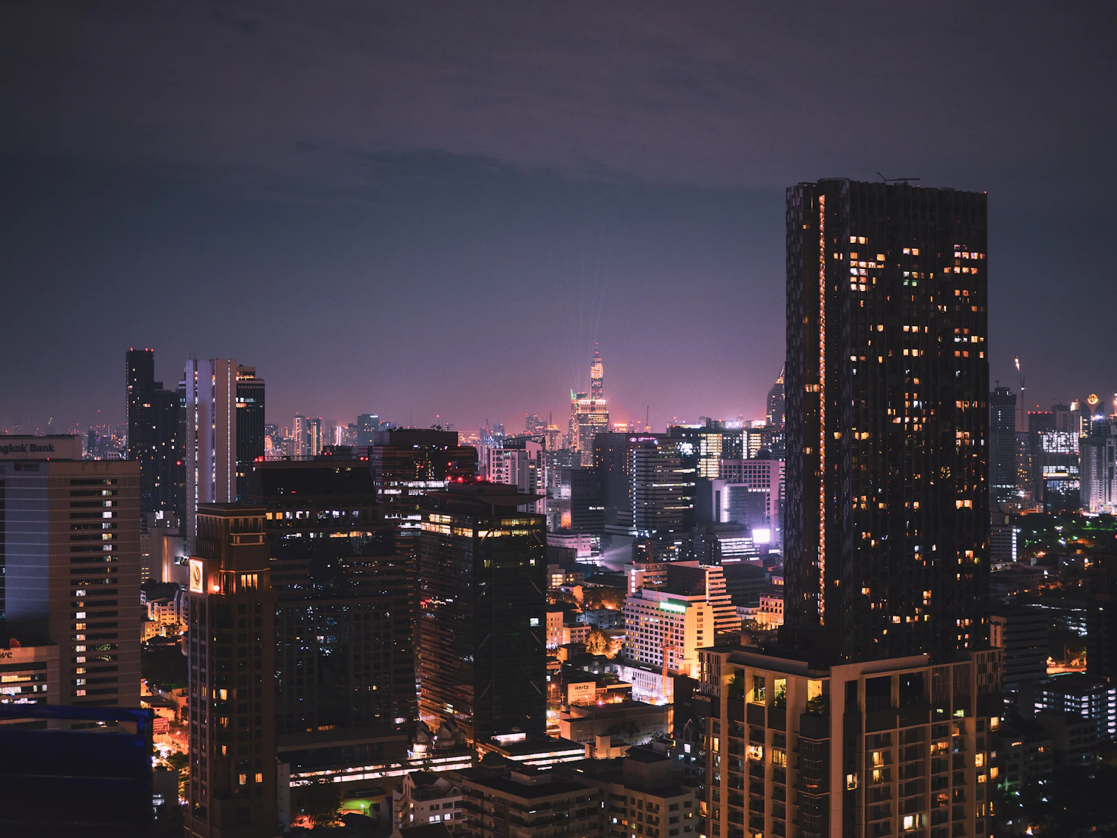 Bangkok city skyline at night from a rooftop