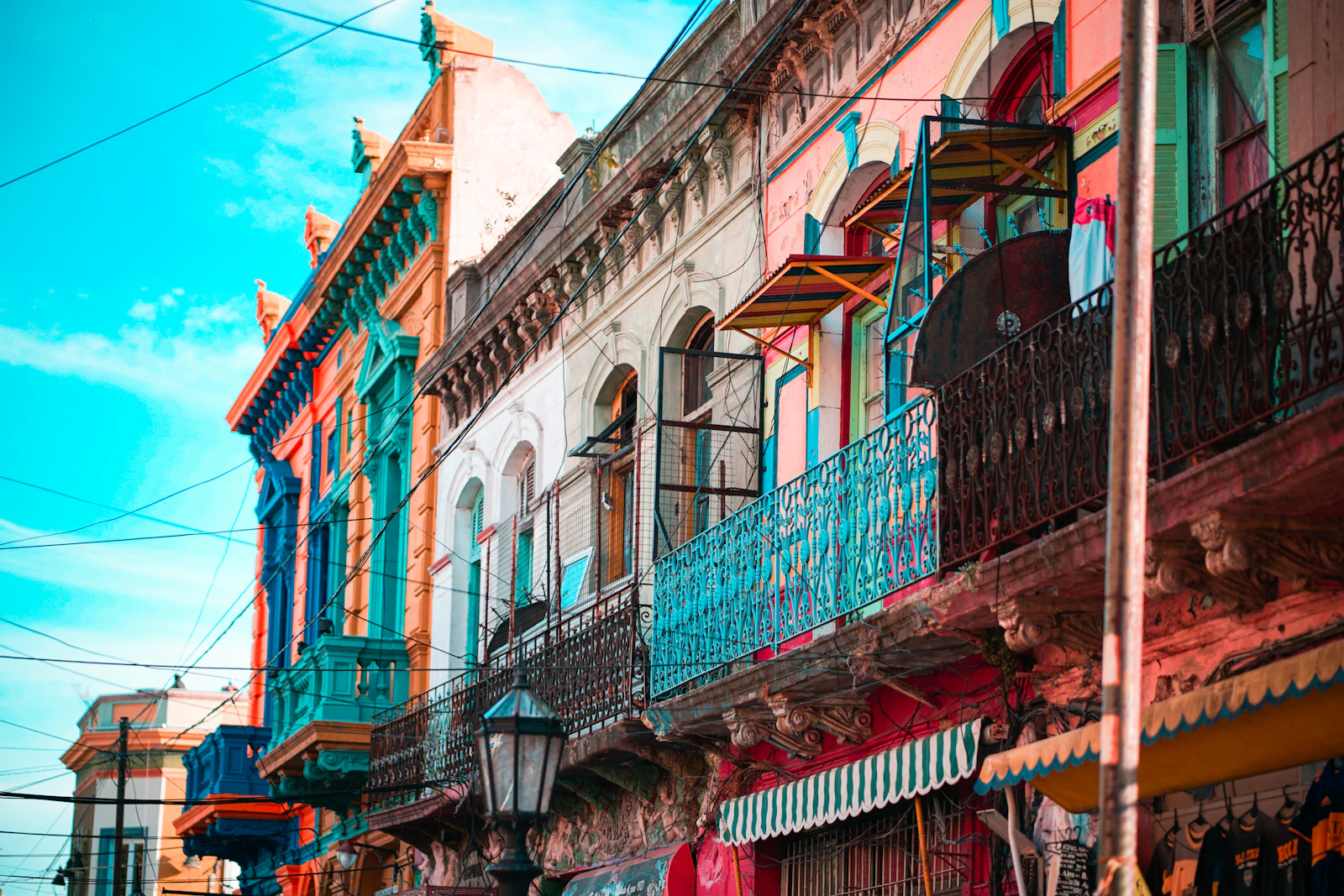 Colorful buildings and tango scene along Caminito in La Boca