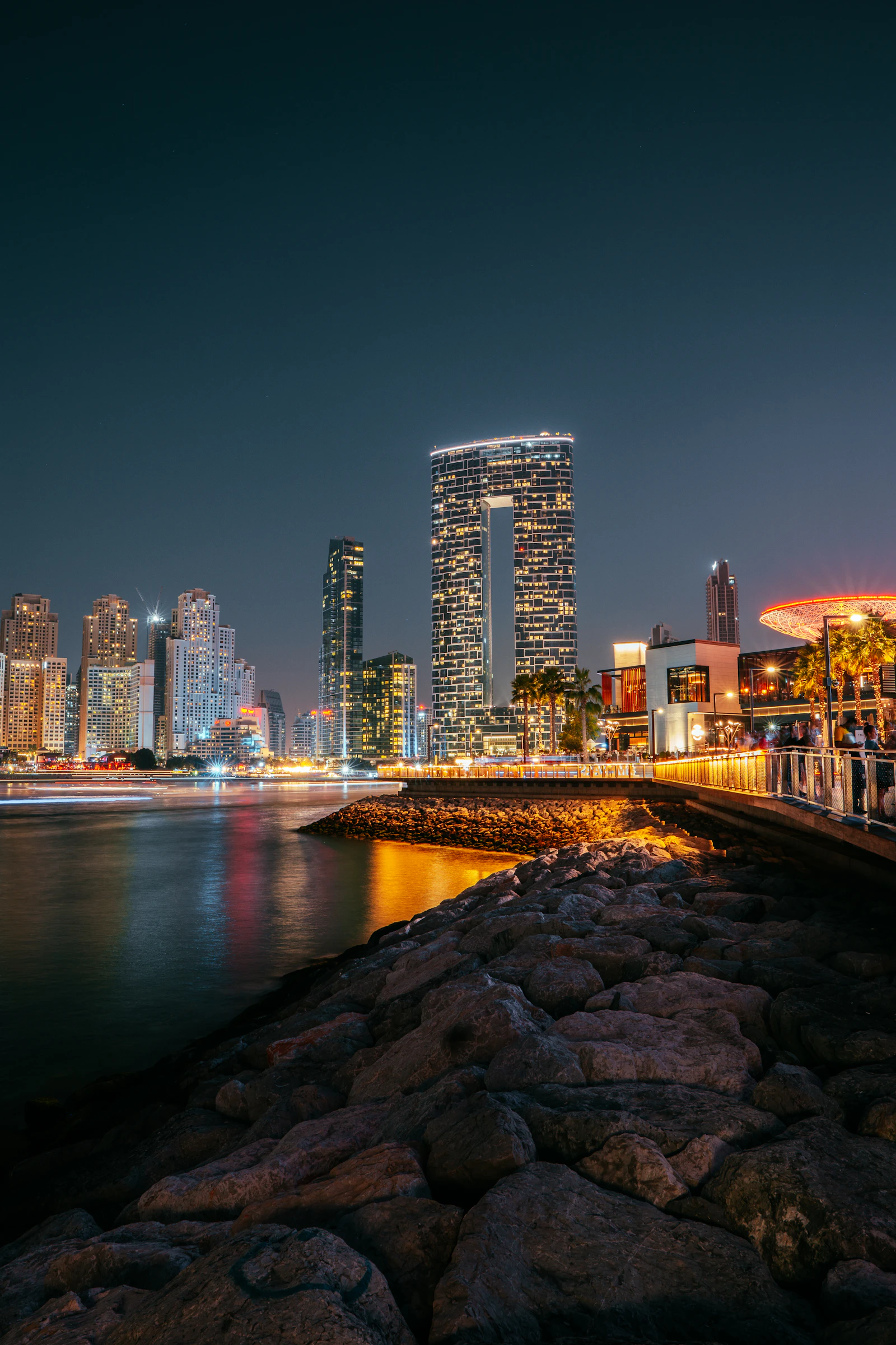 Dubai Marina skyline at night from the waterfront