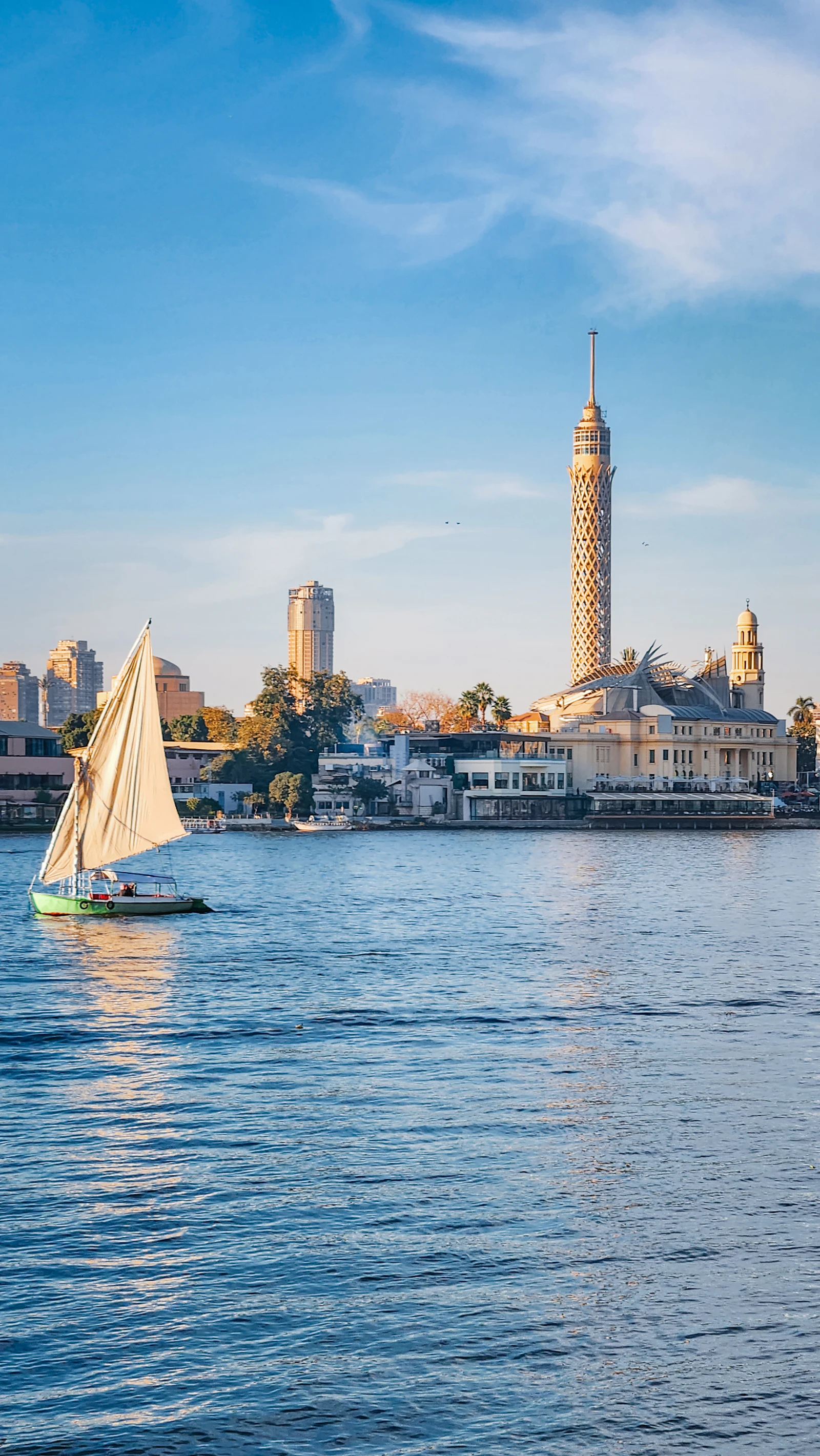Sailboat on the Nile River with Cairo Tower in the background