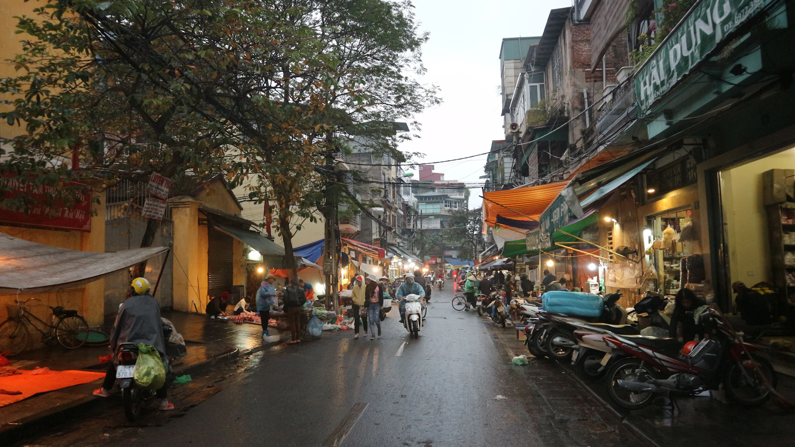 Motorcycles on a busy street in Hanoi Old Quarter