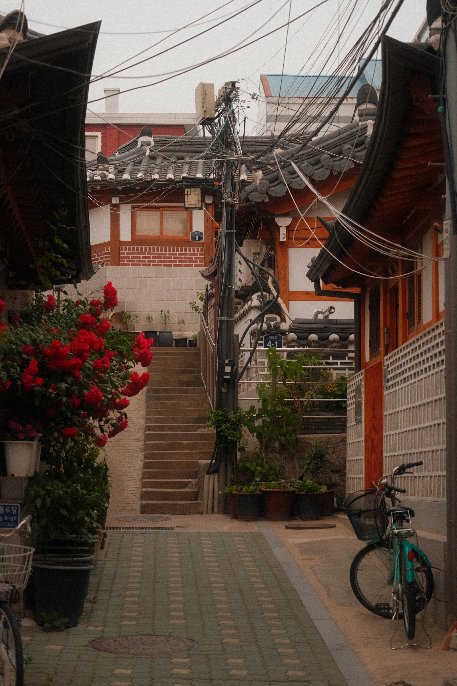Alleyway past traditional buildings in Bukchon Hanok Village, Seoul
