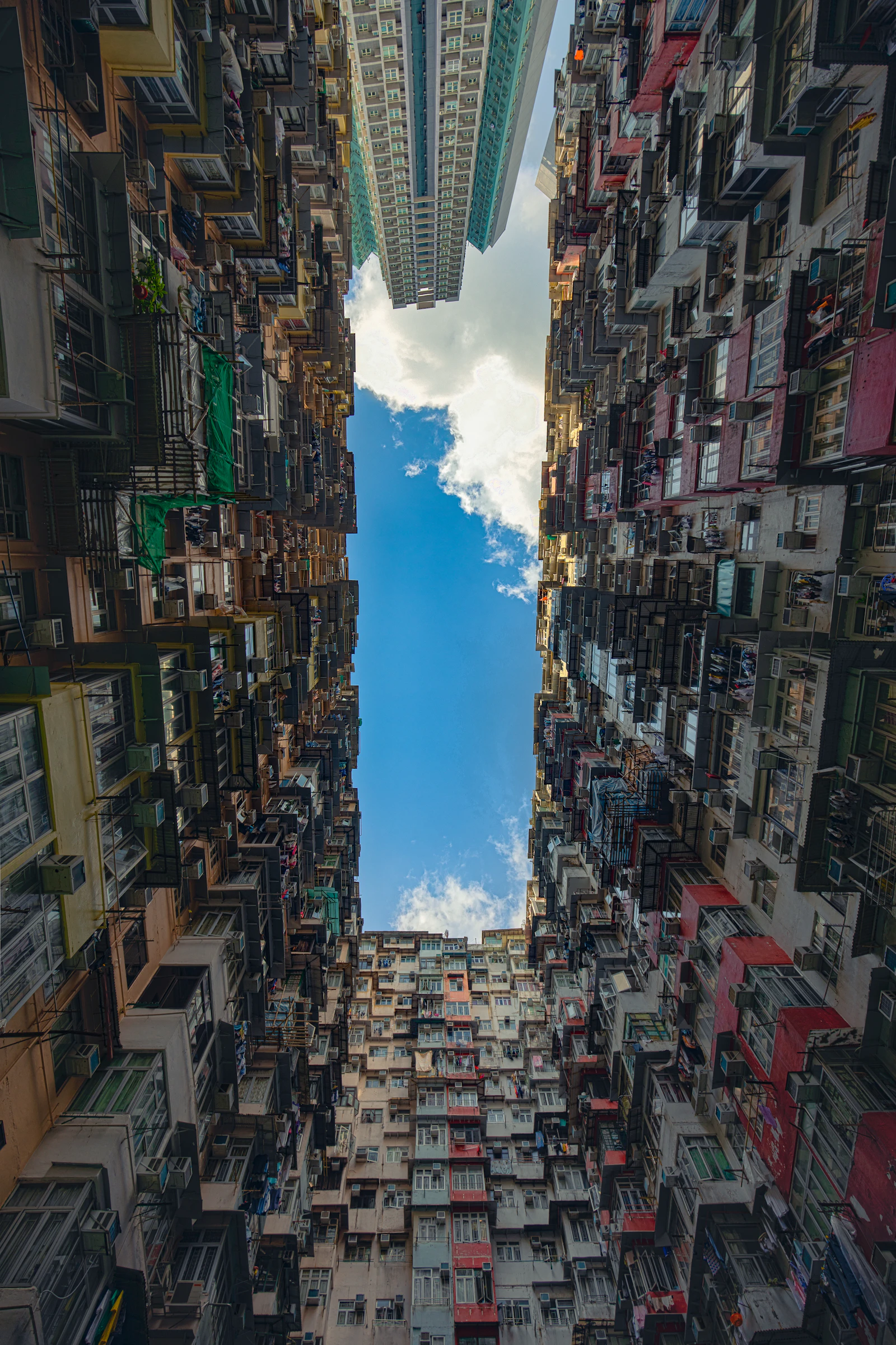 Looking up at packed Hong Kong apartment buildings