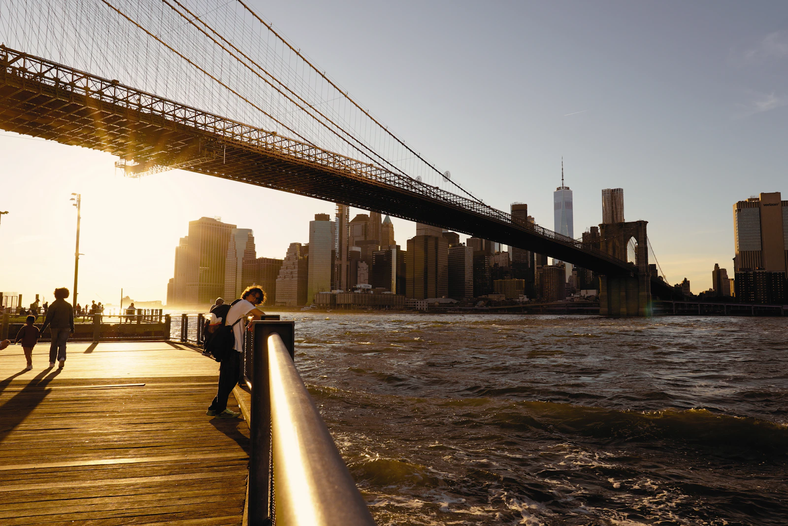 Brooklyn Bridge and Manhattan skyline at sunset
